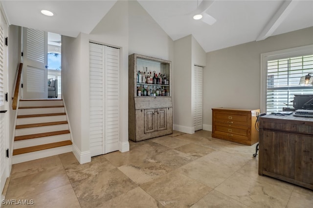 office area featuring vaulted ceiling