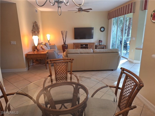 tiled living room featuring ceiling fan