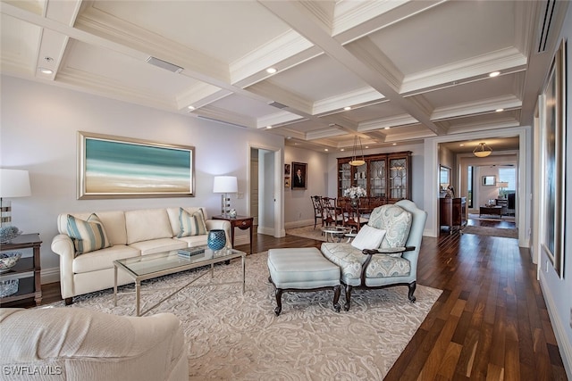 living room featuring beam ceiling, wood-type flooring, coffered ceiling, and ornamental molding