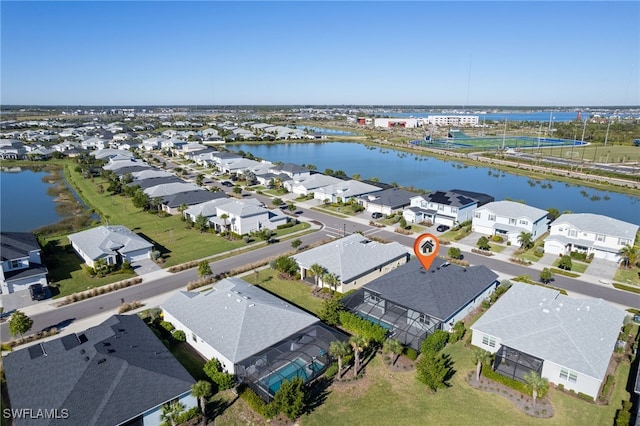 drone / aerial view with a water view