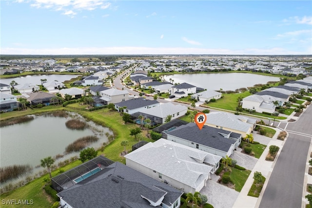 drone / aerial view featuring a water view