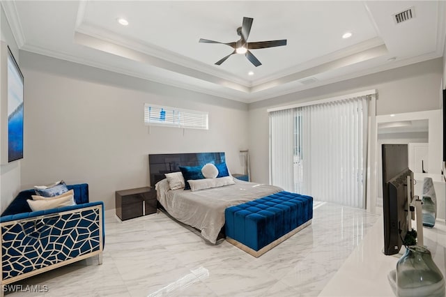 bedroom with a tray ceiling, ceiling fan, and crown molding