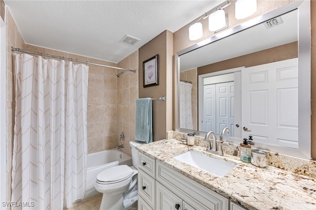 full bathroom featuring vanity, shower / bath combination with curtain, a textured ceiling, and toilet