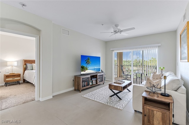 living room with ceiling fan