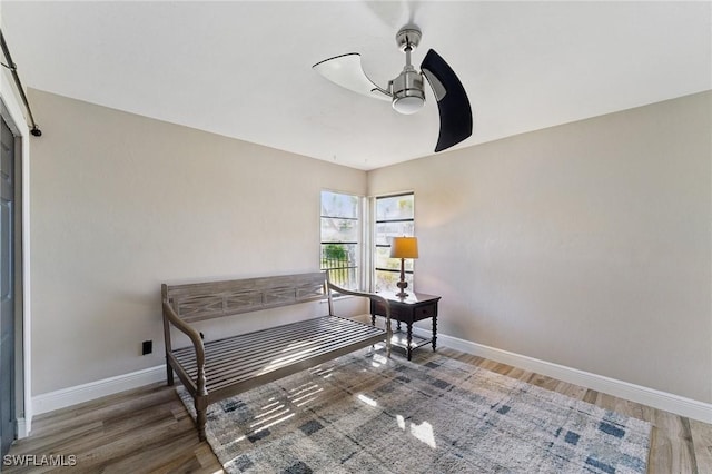 bedroom featuring ceiling fan and dark hardwood / wood-style floors