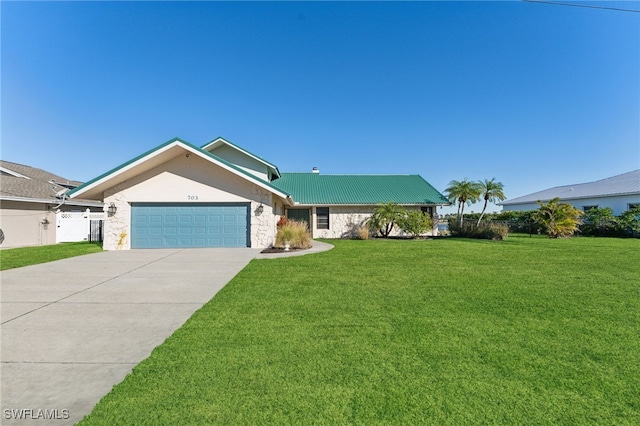 single story home with a garage and a front lawn