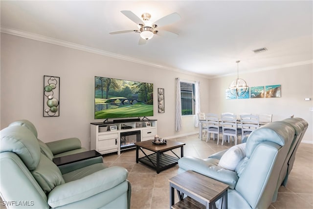 tiled living room featuring crown molding and ceiling fan with notable chandelier