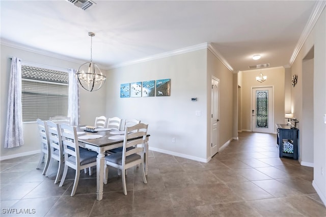 dining room featuring tile patterned flooring, a chandelier, and ornamental molding