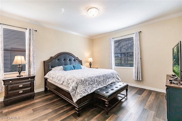 bedroom featuring dark hardwood / wood-style flooring and ornamental molding