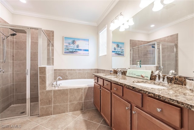 bathroom with tile patterned flooring, vanity, independent shower and bath, and ornamental molding