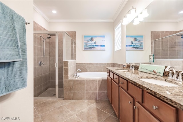 bathroom featuring tile patterned flooring, vanity, shower with separate bathtub, and ornamental molding