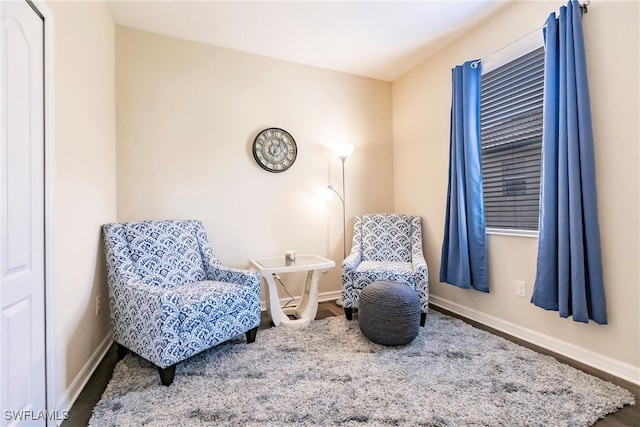 sitting room featuring hardwood / wood-style flooring