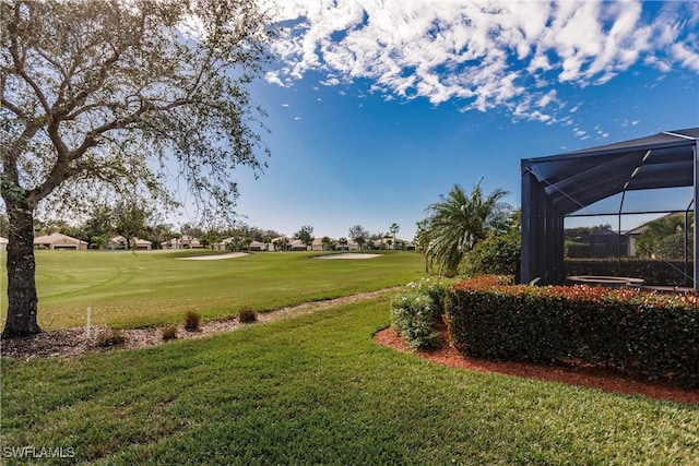 surrounding community featuring a lawn