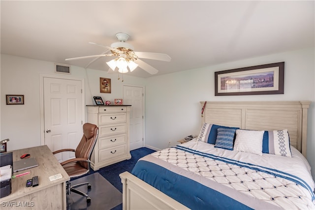 carpeted bedroom with ceiling fan