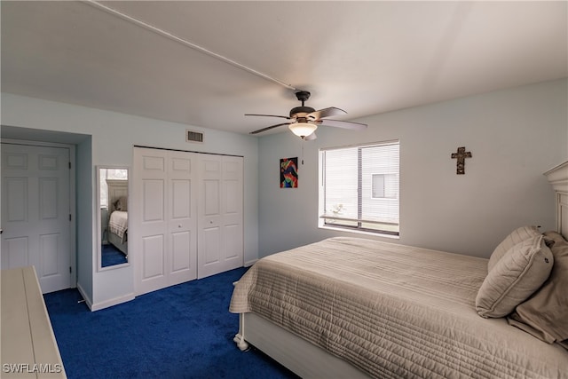 bedroom with a closet, dark carpet, and ceiling fan