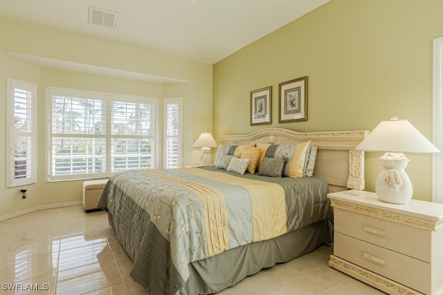 bedroom featuring light tile patterned floors