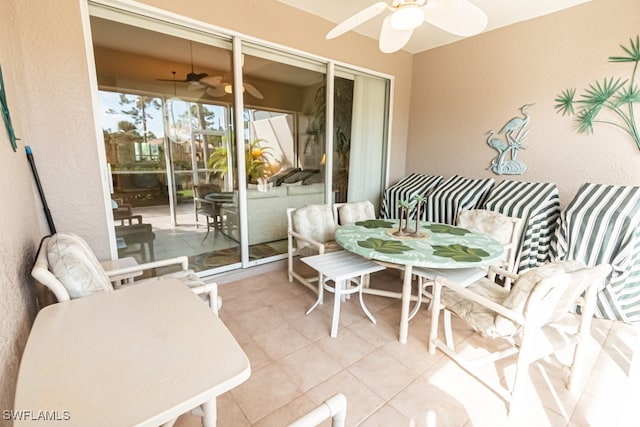 view of patio / terrace featuring ceiling fan