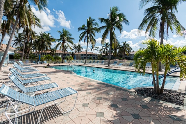 view of pool featuring a patio