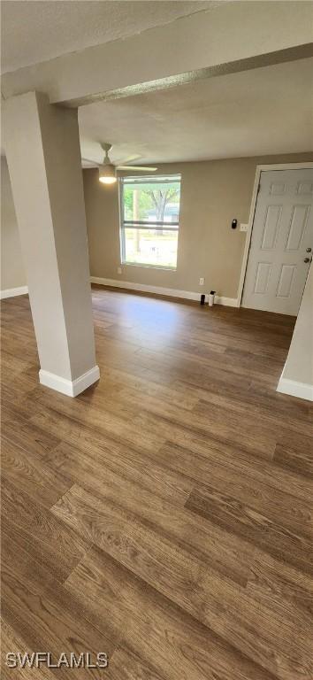 spare room with hardwood / wood-style flooring