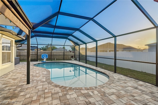 3530 NE 12th Ct, Cape Coral, FL 33909 - view of pool with a fenced backyard, a patio area, and glass enclosure