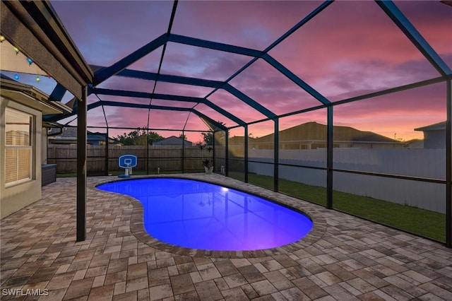 3530 NE 12th Ct, Cape Coral, FL 33909 - view of pool featuring a patio, a fenced backyard, and a lanai
