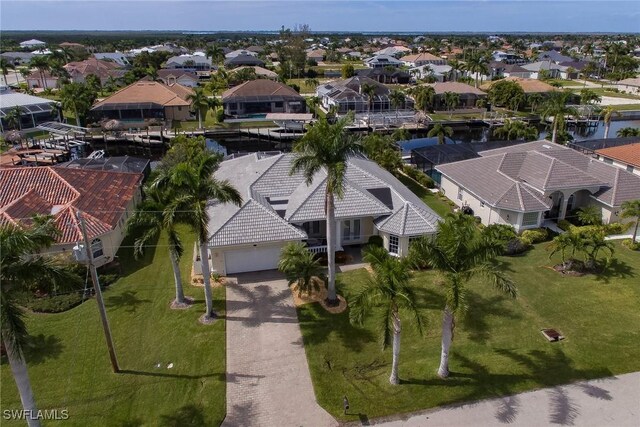 4126 SW 27th Ave, Cape Coral, FL 33914 - aerial overview of property's location with nearby suburban area and a large body of water