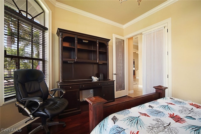 bedroom featuring french doors, wood-type flooring, and ornamental molding