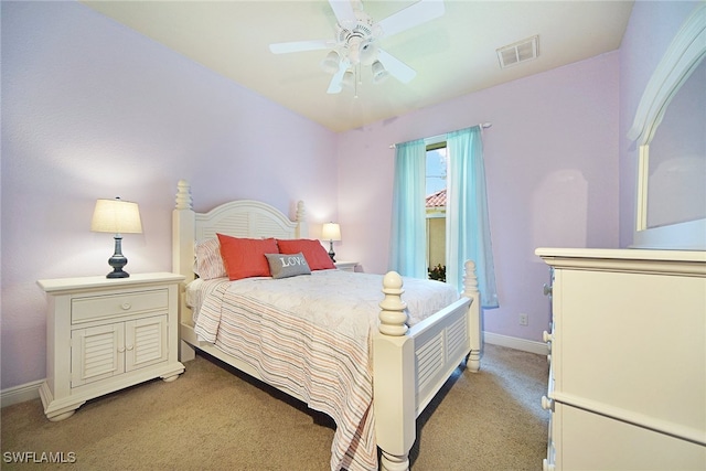 bedroom with light colored carpet and ceiling fan