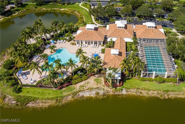 birds eye view of property featuring a water view