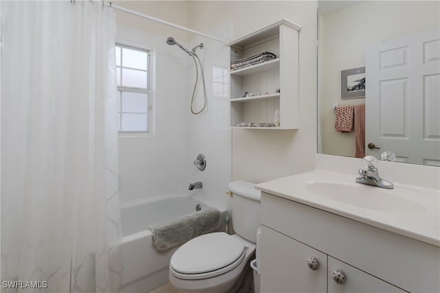 full bathroom featuring vanity, shower / bath combination with curtain, and toilet