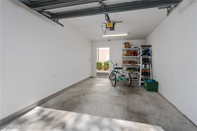 garage featuring a garage door opener