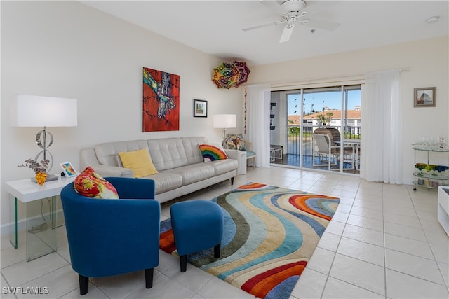 tiled living room with ceiling fan