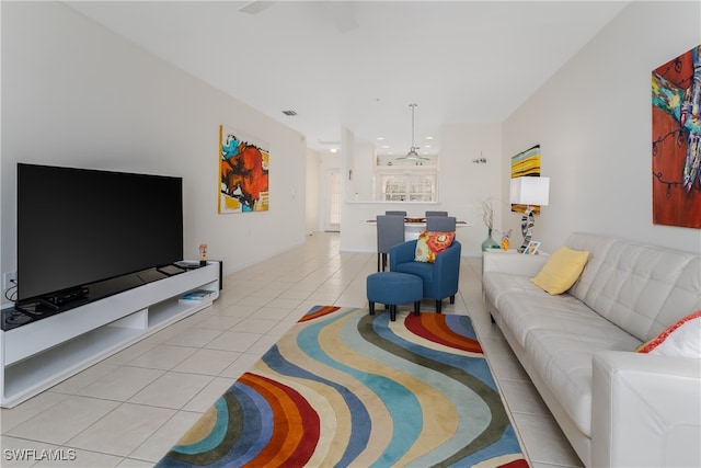 living room with light tile patterned floors