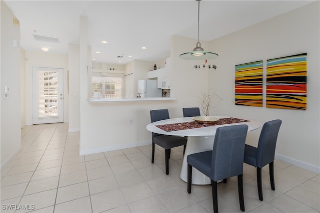 view of tiled dining space