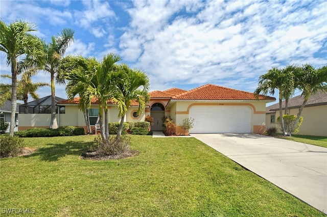 mediterranean / spanish-style home featuring a garage and a front yard