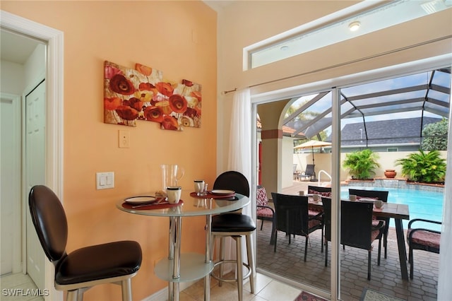 dining room with light tile patterned floors