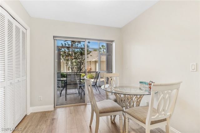 dining space featuring light hardwood / wood-style floors