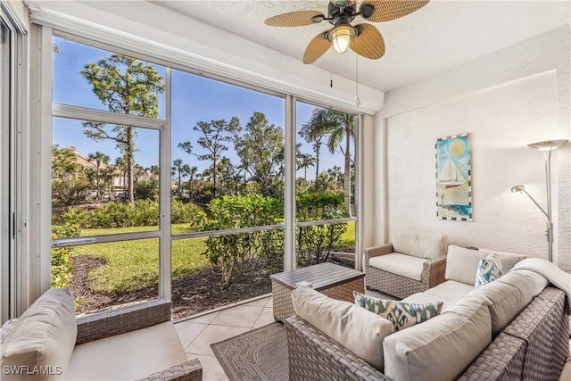 sunroom with ceiling fan