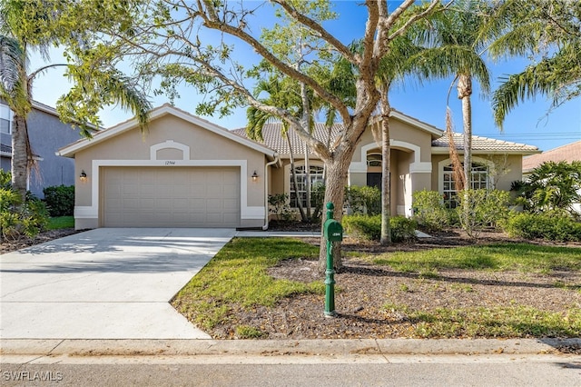 single story home with a garage