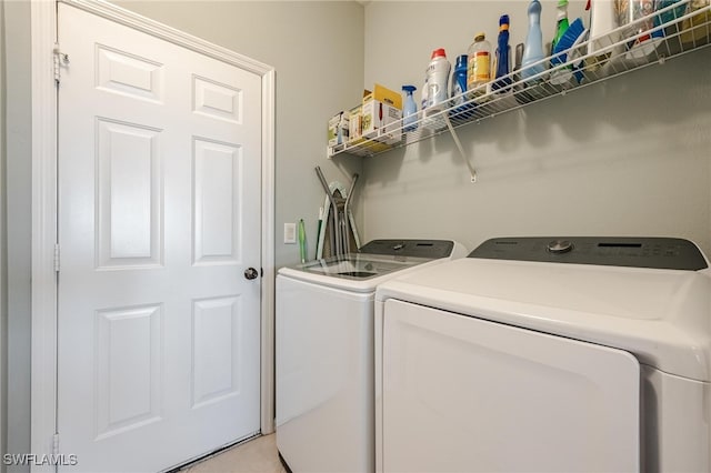 laundry area featuring washer and clothes dryer