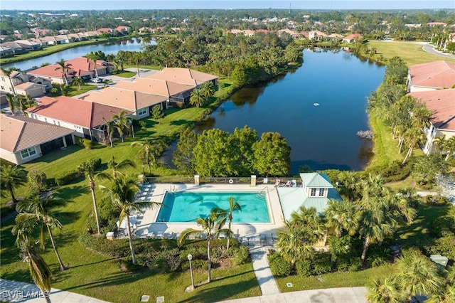 drone / aerial view with a water view