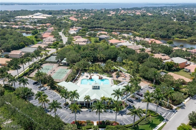 bird's eye view with a water view