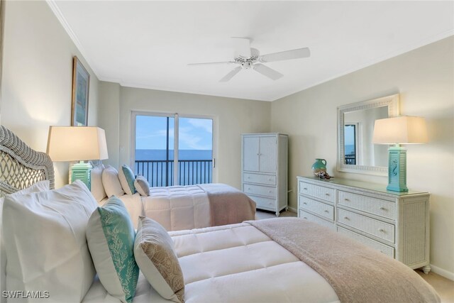 carpeted bedroom featuring access to exterior, a water view, ceiling fan, and crown molding