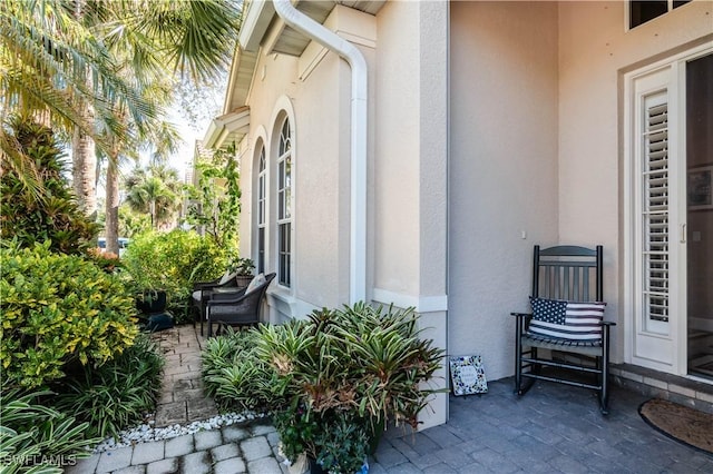 16144 Parque Ln, Naples, FL 34110 - property entrance featuring stucco siding