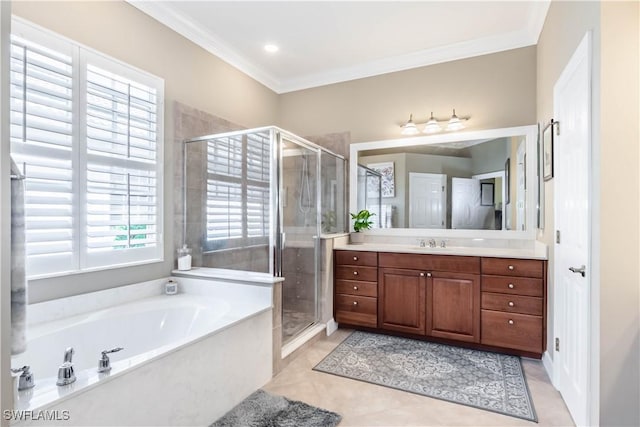 bathroom with tile patterned flooring, vanity, crown molding, and shower with separate bathtub