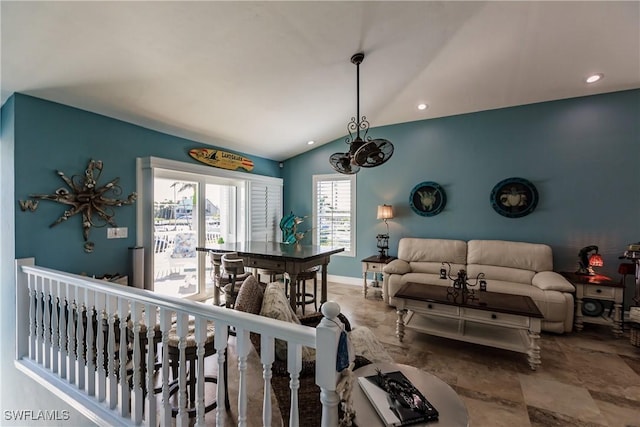 dining room featuring lofted ceiling