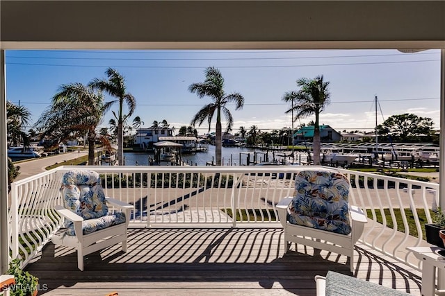 wooden terrace with a water view