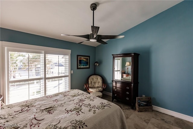 bedroom featuring lofted ceiling and ceiling fan