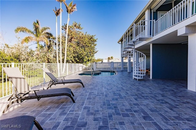 view of patio / terrace with a fenced in pool