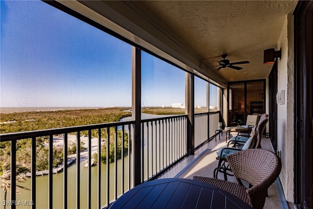 balcony featuring ceiling fan